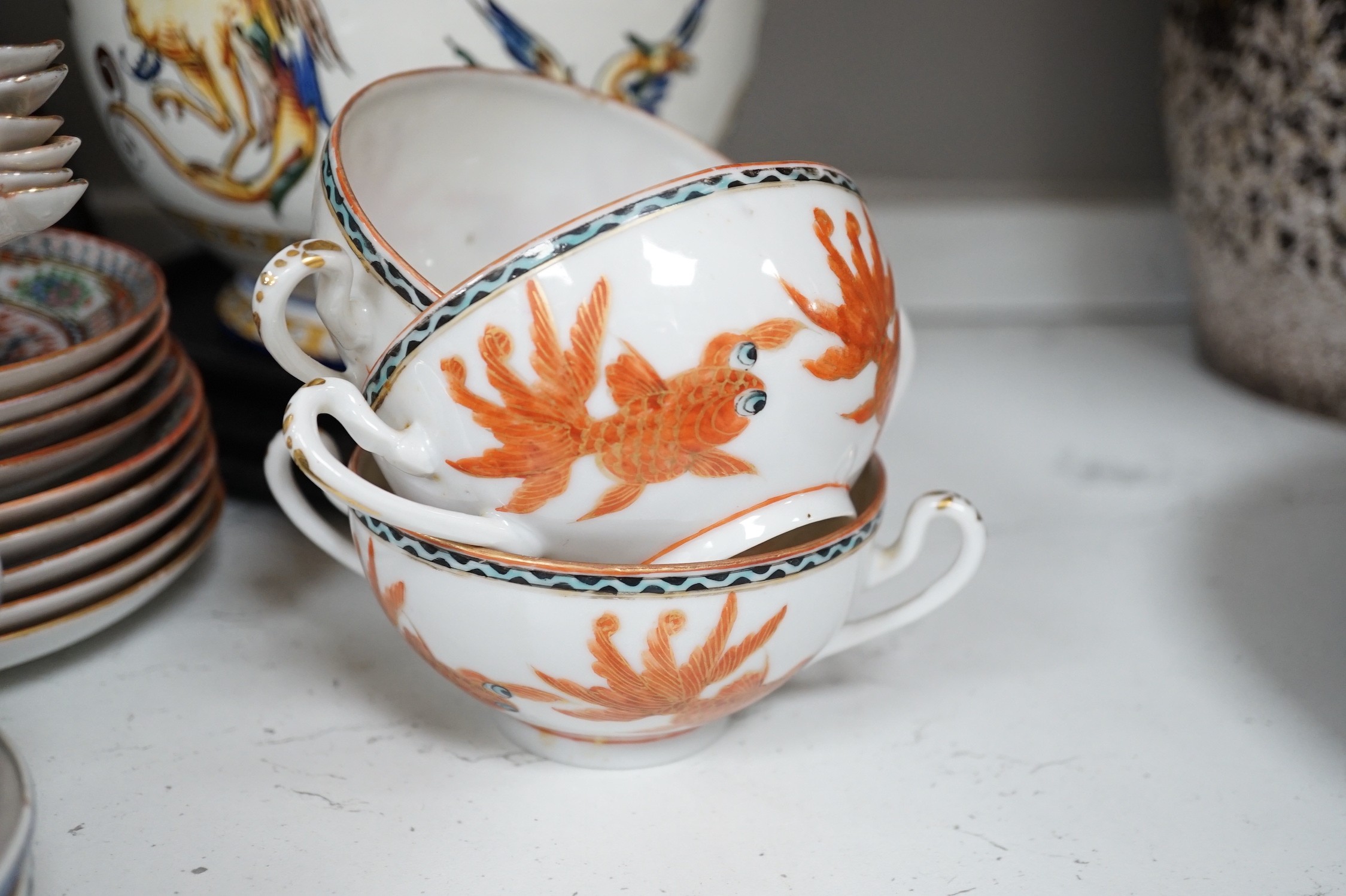 A Gien pottery jug, a Chinese crackle glaze baluster vase, egg-shell tableware and three Oriental wood stands